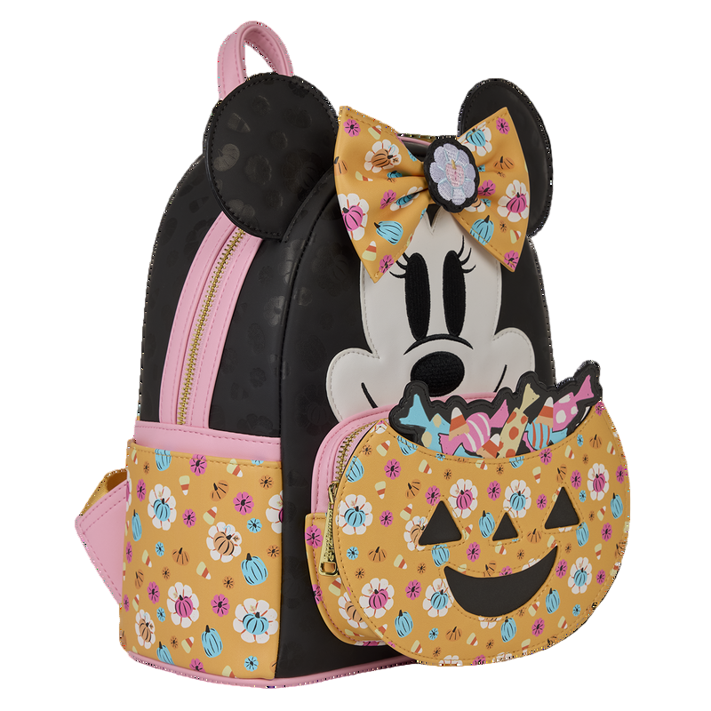 Backpack with Minnie Mouse design featuring a pumpkin and floral patterns on a white background