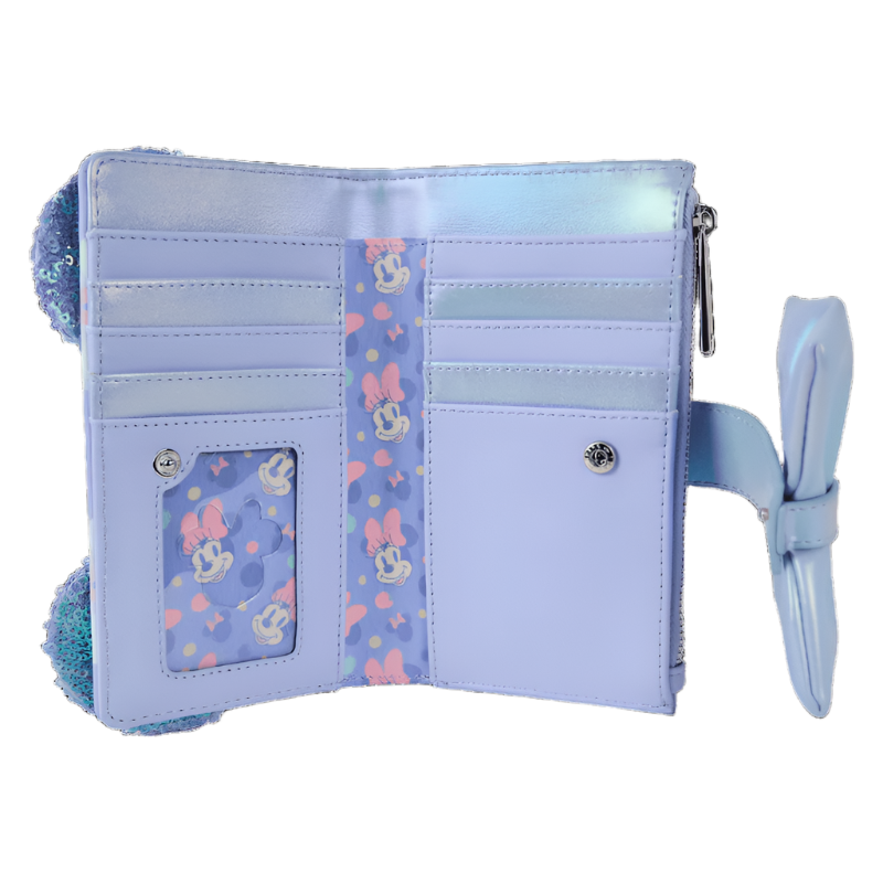 Light blue wallet with decorative strap and pom-pom on a white background