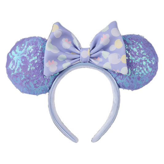 Lavender mouse ears with a bow and sequin details on a white background