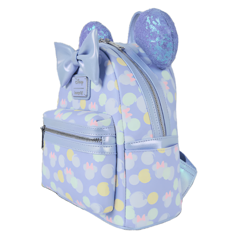 Light blue backpack with polka dot pattern and decorative elements on a white background