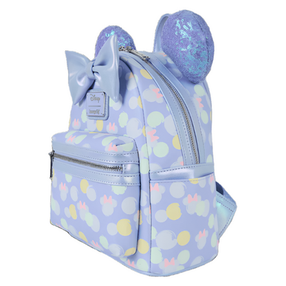Light blue backpack with polka dot pattern and decorative elements on a white background