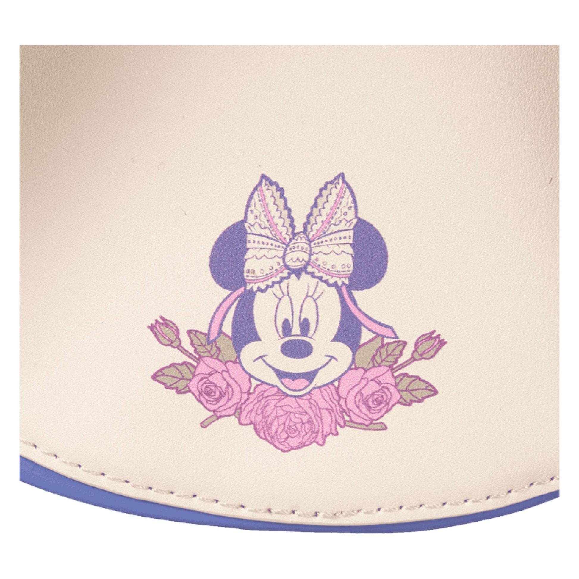 crossbody bag with Minnie Mouse design featuring a bow and flowers on a beige background