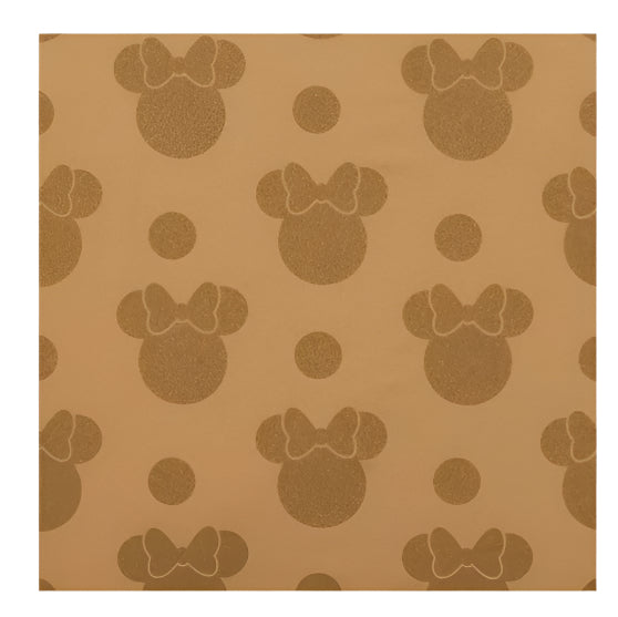 Pattern of Minnie Mouse heads with bows on a brown/gold background