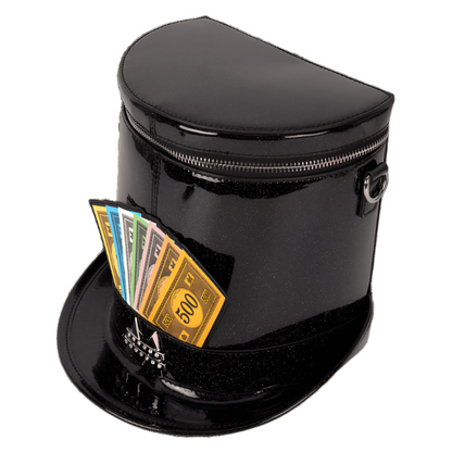 Side and top view of the Figural Crossbody Bag with gold and blue dollar bills sticking out of it on a white background