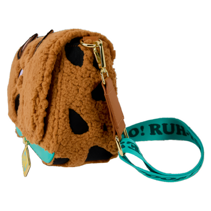 Brown textured bag with a turquoise strap and 'RUH' text on a white background