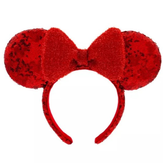 Red Mouse Ears headband with black speckles on a white background