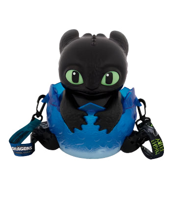 Popcorn bucket of the dragon character Toothless with black and blue design on a white background