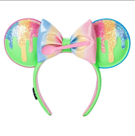 Colorful headband with rainbow design and bow on a white background