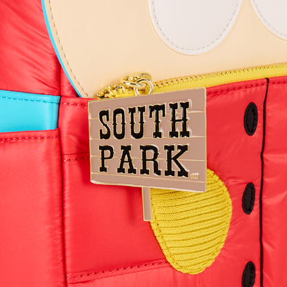 Close-up of South Park Cartman Mini Backpack with a 'South Park' zipper charm on a colorful background