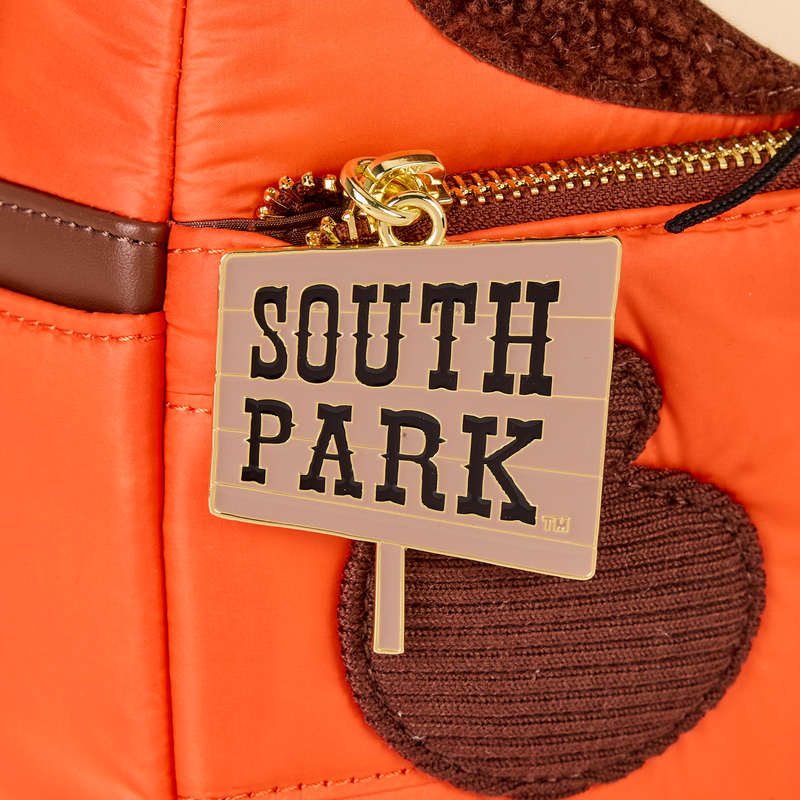 Close-up of South Park Kenny Cosplay Mini Backpack with a 'South Park' bag charm sign attached.