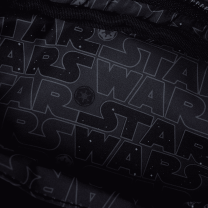 Close-up of a black Star Wars logo with repeated text pattern.