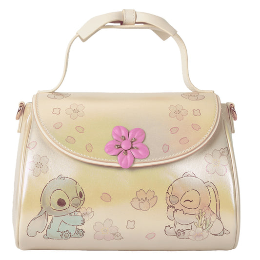 Front Stitch & Angel Cherry Blossom Bow Handle Crossbody Bag and floral design on a white background