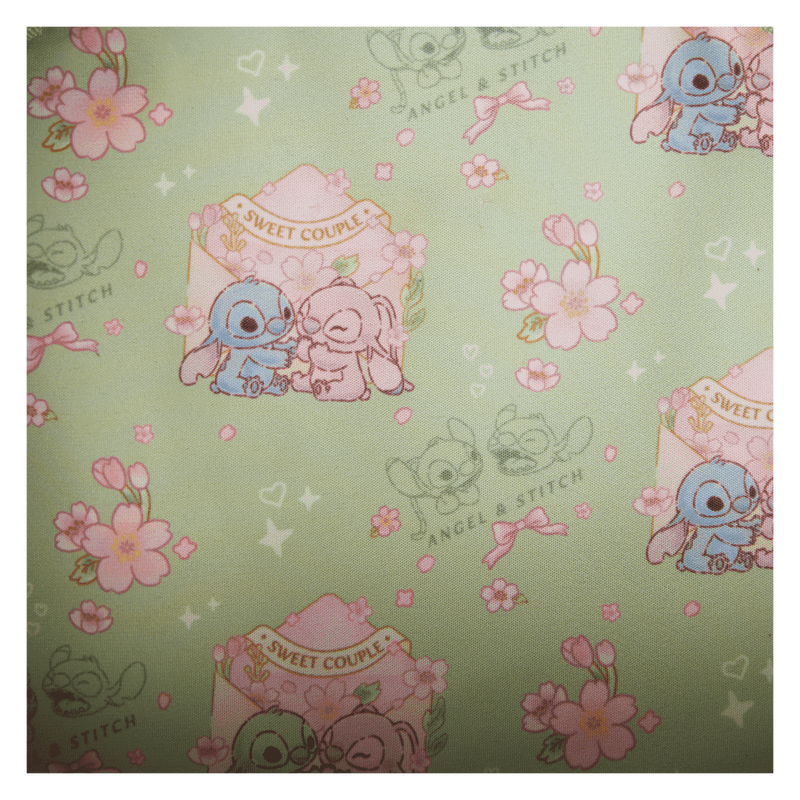 Patterned fabric with stitch and angel and floral designs on a green background