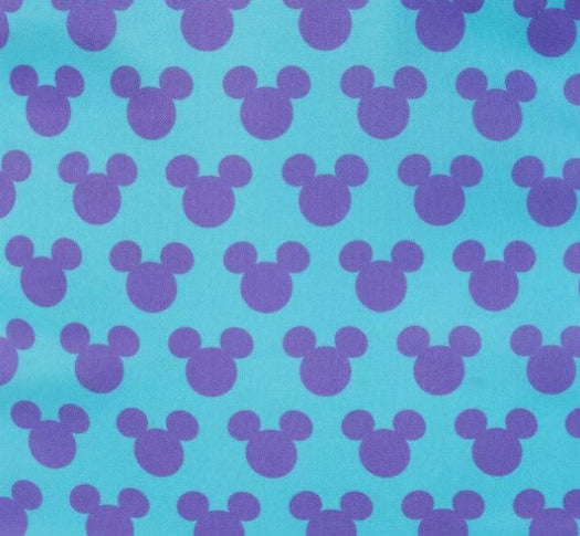 Pattern of purple Mickey Mouse heads on a blue background