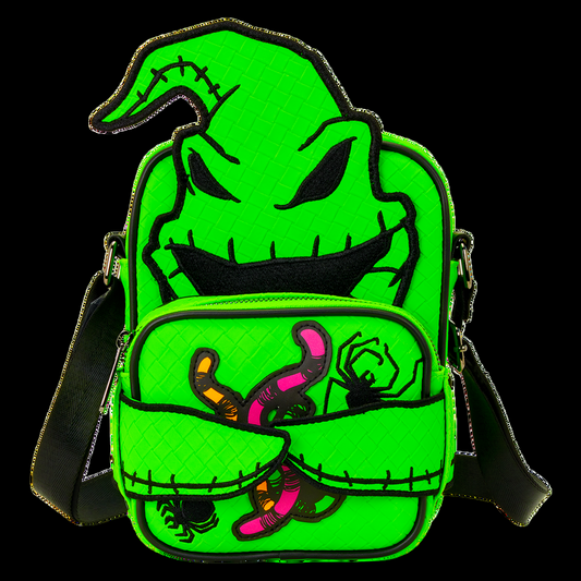 Glowing in the dark green bag with Oogie Boogie design of a face and small creatures on a white background
