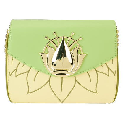 Green and yellow handbag with a gold emblem on a white background