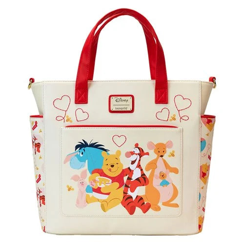 Tote bag with Winnie the Pooh characters and red handles on a white background