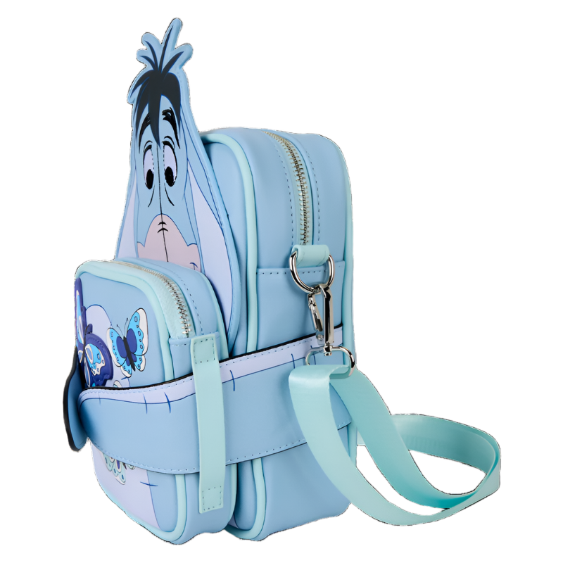 Side view of Crossbody Bag with Eeyore and floral design on a white background