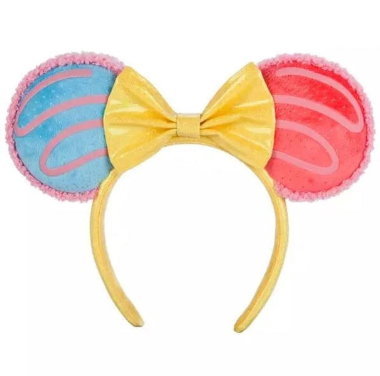Colorful headband with ears and a yellow bow on a white background