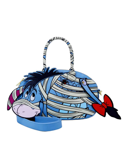 Front Mummy Eeyore crossbody bag with mummy pattern on a white background