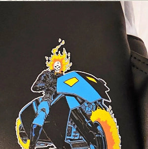 Colorful graphic of a skeleton on a motorcycle with flames on a black background