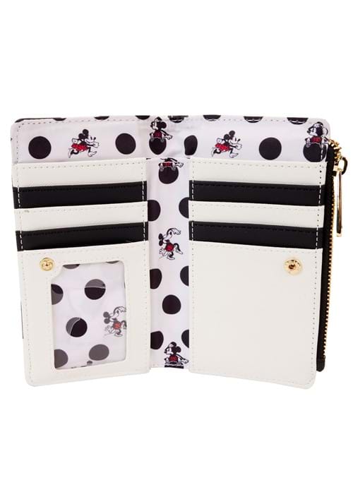 White wallet with black polka dot pattern featuring Minnie Mouse on a white background