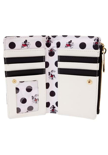 White wallet with black polka dot pattern featuring Minnie Mouse on a white background