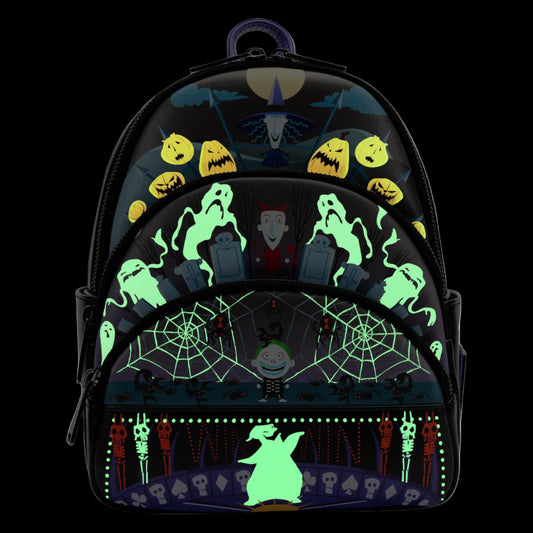 Glowing NBC halloween-themed backpack with ghost, pumpkin, and various nbc character designs on a black background.