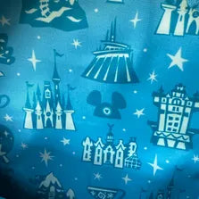 Pattern of blue castles and stars on a blue background