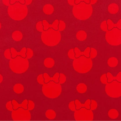 Red pattern of Minnie Mouse heads with bows on a red background