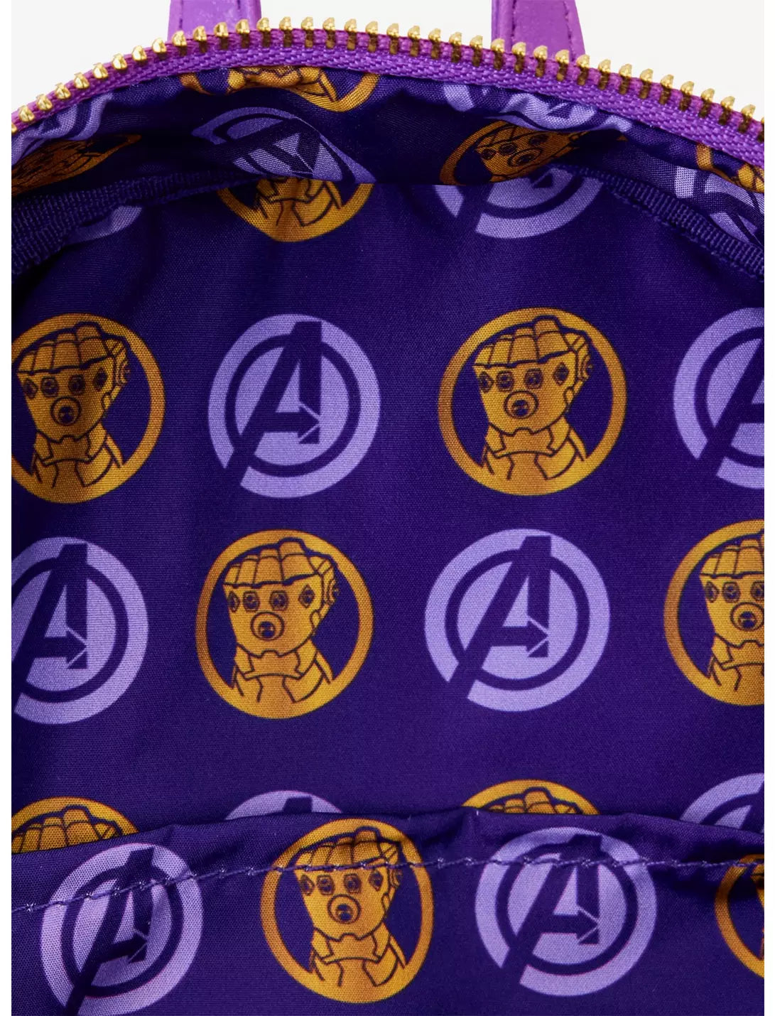 Interior of the bag is purple with Avengers logos and character images on a purple background