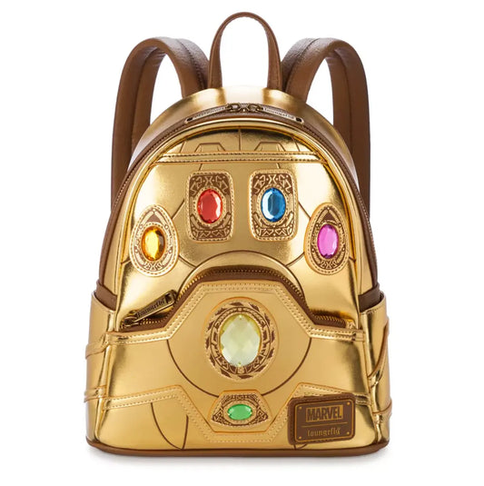 Gold backpack with gemstone accents on a white background