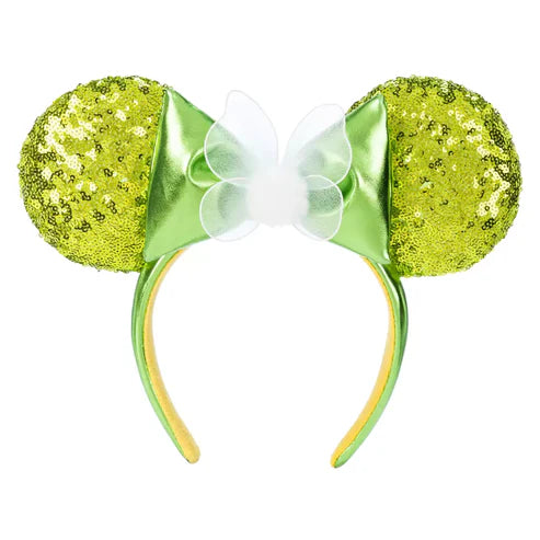 Green glittery mouse ears with a bow on a white background