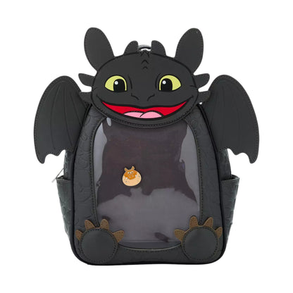 Pin backpack designed like Toothless the dragon with a smiling face on a white background