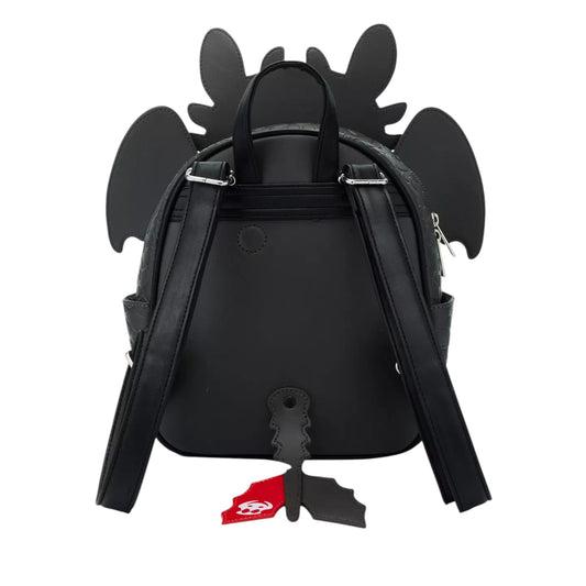 Black backpack with Toothless the dragon design on a white background